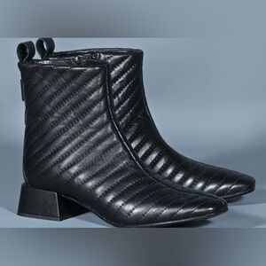 Napoleoni black quilted leather ankle boots